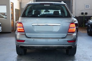 MERCEDES ML W164 2008-2011 PO FACELIFTINGU LEWY ODBLASK LAMPA TYLNEGO ZDERZAKA A1648200374