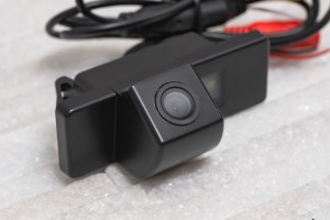 NISSAN PRIMERA P12 2002-2007 KAMERA COFANIA Z LAMPĄ