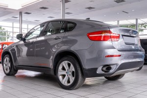 BMW X6 E71 2007-2014 LAMPA PRZECIWMGIELNA TYLNA LEWA Z ODBLASKIEM 63147187219