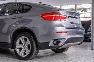 BMW X6 E71 2007-2014 LAMPA PRZECIWMGIELNA TYLNA LEWA Z ODBLASKIEM 63147187219