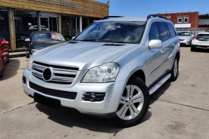 MERCEDES GL X164 2006-2009 PRZED FACELIFTINGIEM RAMKA LAMPY PRZECIWMGIELNEJ KRATKA PRZEDNIEGO ZDERZAKA LEWA A1648855523