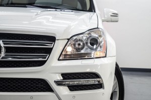 MERCEDES GL X164 2009-2012 PO FACELIFTINGU RAMKA LAMPY PRZECIWMGIELNEJ KRATKA PRZEDNIEGO ZDERZAKA LEWA A1648847122 