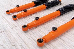 JEEP WRANGLER JK 2007-2018 AMORTYZATORY OLEJOWE DO LIFTU 2,5-3" KOMPLET POMARAŃCZOWE