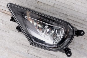 VOLKSWAGEN TOUAREG II 7P 2014-2018 PO FACELIFTINGU LAMPA PRZECIWMGIELNA PRZEDNIA LEWA 7P6941699G