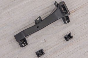 HYUNDAI ELANTRA VI AD 2015-2020 WSPORNIK REFLEKTORA LEWY 64118F2000