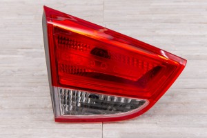 HYUNDAI ix35 LM 2010-2013 PRZED FACELIFTINGIEM LAMPA KLAPY TYLNEJ LEWA 924052Y0
