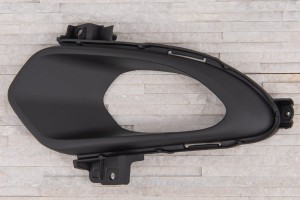 KIA CEED II JD 2012-2015 PRZED FACELIFTINGIEM RAMKA LAMPY PRZECIWMGIELNEJ PRZEDNIA LEWA 86563A2000