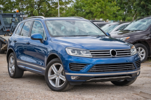 VOLKSWAGEN TOUAREG II 7P 2014-2018 PO FACELIFTINGU LISTWA SPOILER PRZEDNIEGO ZDERZAKA 7P6807725