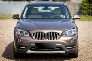 BMW X1 E84 2013-2015 PO FACELIFTINGU ZAŚLEPKA SPRYSKIWACZA REFLEKTORA LEWA 51117347661
