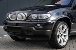 BMW X5 E53 2004-2006 PO FACELIFTINGU ZAŚLEPKA SPRYSKIWACZA REFLEKTORA LEWA 61677145235