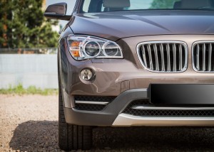 BMW X1 I E84 2009-2015 WYPRZEDAŻ NAKŁADKI NA LAMPY PRZEDNIE